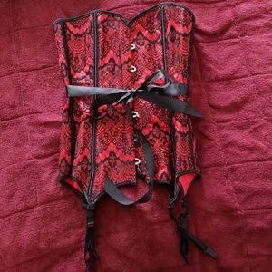 Red corset with black lace